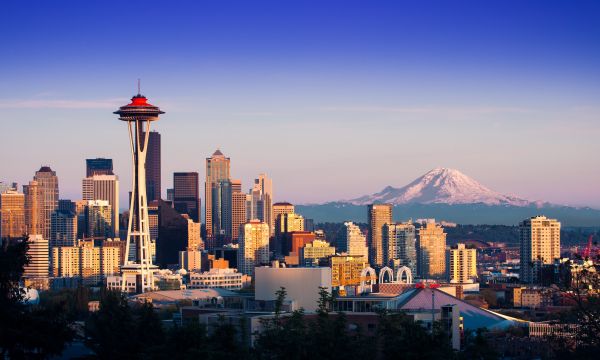 Photo of Seattle, WA city skyline with Space Needle and Mt. Rainier